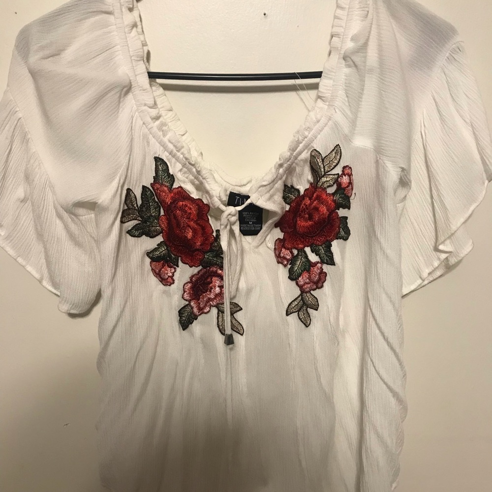 Beautiful white with flowers shirt